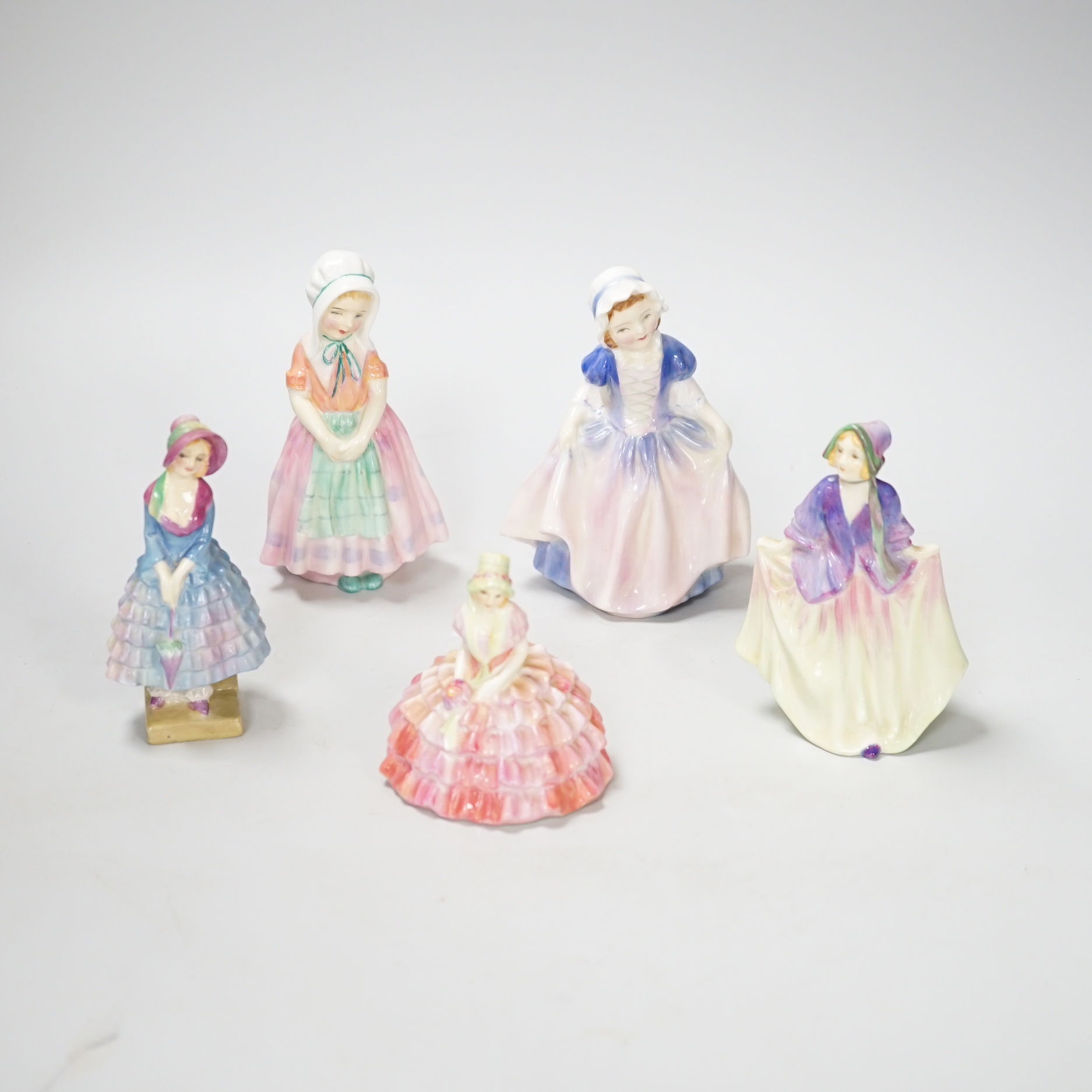 Five royal Doulton figurines, three figures pre HN numbers: Priscilla M5, Chloe M9, Sweet Anne M.5